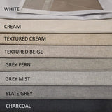 Stack of fabric swatches in various colors with labels underneath.