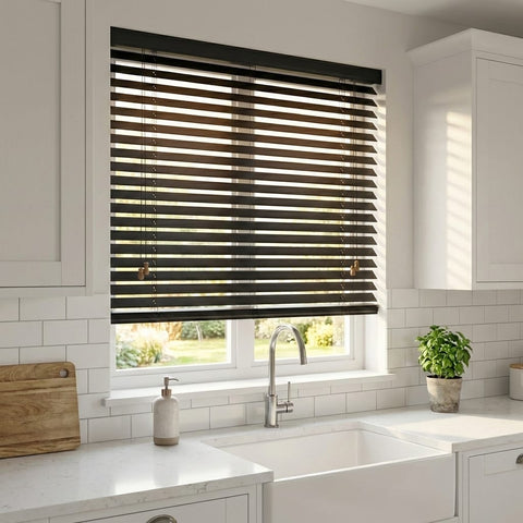Custom cut-to-size black horizontal wood blind in kitchen window.