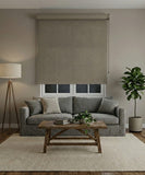 Custom cut-to-size driftwood blockout roller blind in living room setting