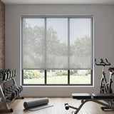Cut to size grey 3% sheer roller blinds in private gym