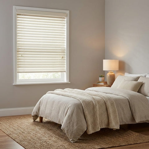 Custom manufactured 50mm wood venetian blind in off white shell colour in bedroom