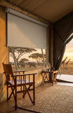Manufactured cut-to-size stone blockout roller blind in safari tented camp
