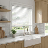 Custom manufactured white 50mm wood venetian blind in kitchen 