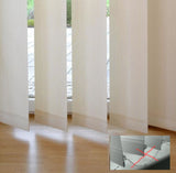 Vertical blinds in a semi-blockout design installed on a window, with a close-up inset showing the chainless freehang system.